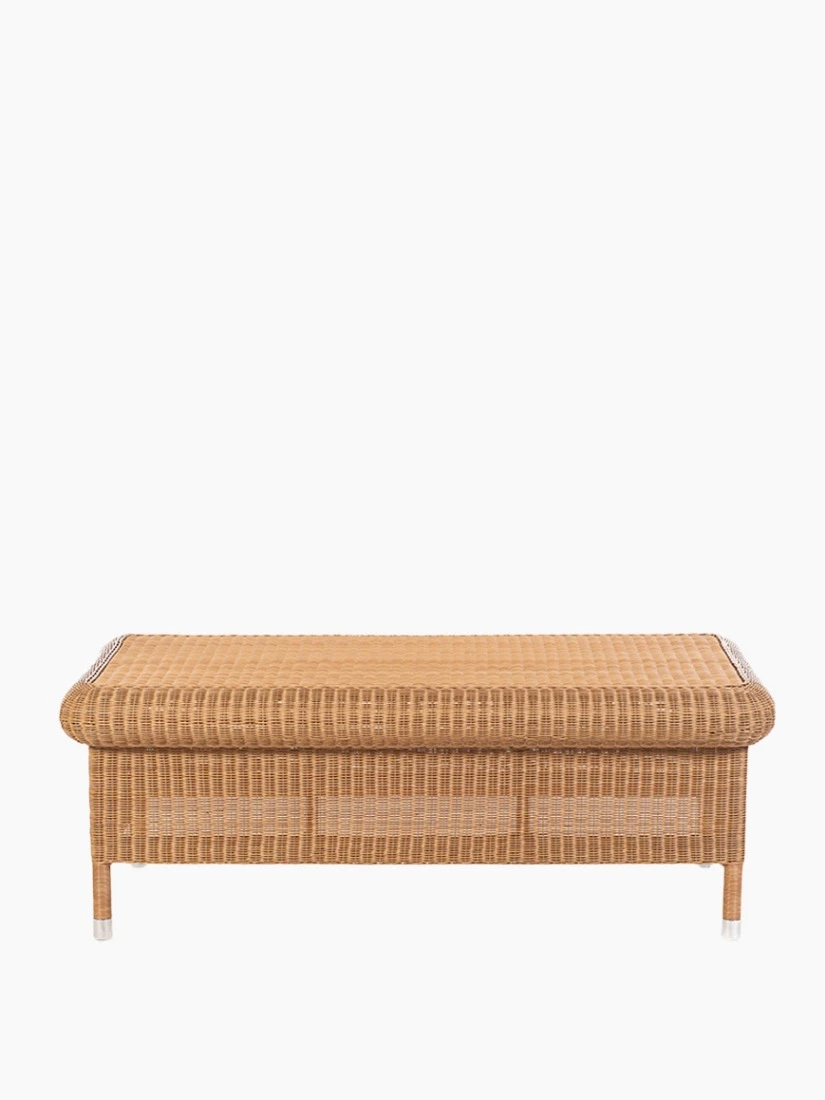 Vincent Sheppard’s Riviera coffee table in honey synthetic wicker with rounded edges and woven detail.